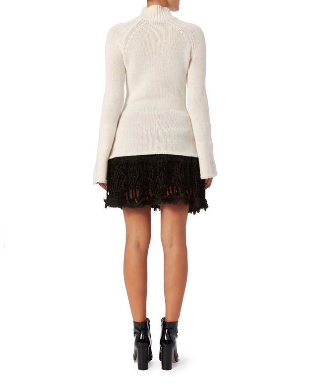 turtleneck with flared sleeves